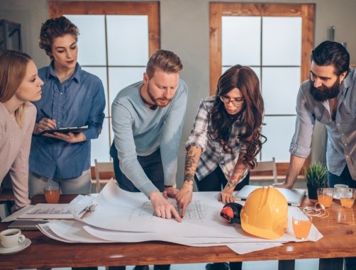 a team of professionals working with homeowners